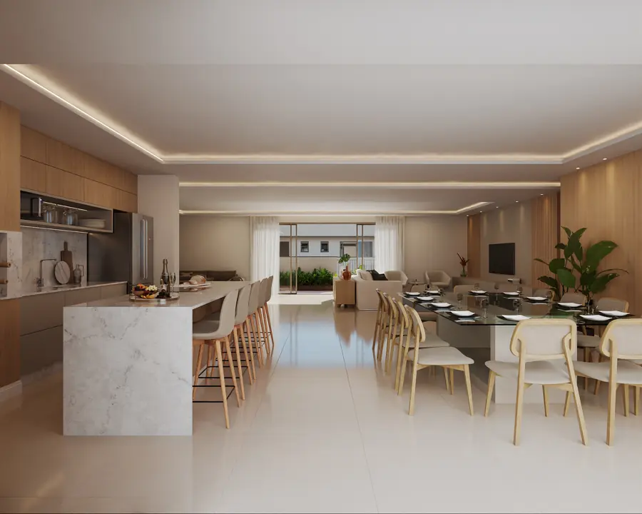 Cozinha com ilha em pedra clara e jantar integrados, na cobertura